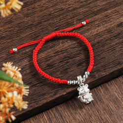 Sterling Silver Year of the Tiger 'ABUNDANCE' Red Rope Bracelet