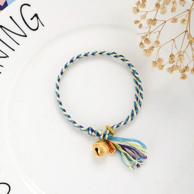 Hand Woven Multicolored 'PICK ME UP' Rope Bell Bracelet