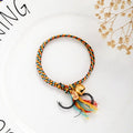 Hand Woven Multicolored 'PICK ME UP' Rope Bell Bracelet